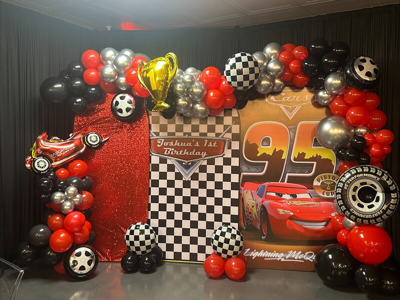 Family-friendly party setup with entertainment equipment and decorations